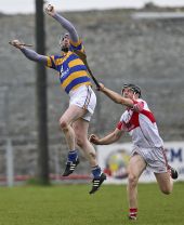 John Hurney rises high to catch the sliothar in the County Senior Hurling Championship match with De La Salle at Walsh Park