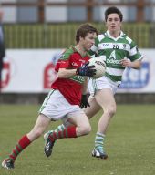 John Power tracks his Clashmore opponent during the County Senior Football Championship Match at Fraher Field