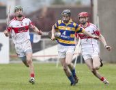 John Power solos away from the De La Salle forward line during the County Senior Hurling Championship clash at Walsh Park