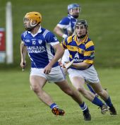 John Power concentrates on dispossessing his opponent during the County Senior Hurling Championship match against Fourmilewater played at Fraher Field
