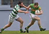Gavin Breen challenging his Kilrossanty marker during the County Senior Football Championship clash played at Fraher Field