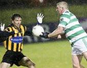 Laurence Hurney offloads the ball during the Western Intermediate Football Final against Brickey Rangers at Fraher Field