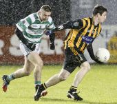 Maurice Power chases down his opponent during the Western Intermediate Football Final v Brickey Rangers at Fraher Field