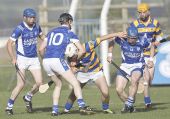 Maurice Power battling to free himself from the shackles of the Fourmilewater attack during the Senior Hurling Quarter Final at Fraher Field