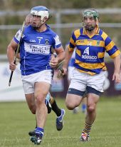 Mark Gorman chases down his Mount Sion opponent during the County Senior Hurling Championship Quarter Final encounter played at Walsh Park