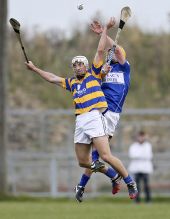 Richie Foley rises high in an attempt to secure possession during the County Senior Hurling Championship game against Mount Sion at Walsh Park