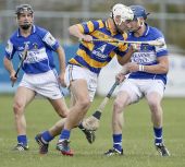 Richie Foley tries to evade the Mount Sion midfield during the County Senior Hurling Championship Quarter Final in Walsh Park