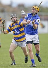 Tiernan Murray focuses on preventing a Mount Sion clearance during the County Senior Hurling Championship Quarter Final match at Walsh Park