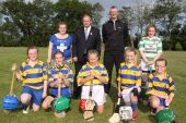 Camogie Players and Mentors with GAA President, Liam O'Neill