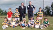 Damien Cliffe with GAA President Liam O'Neill and U6 and U7 panel members