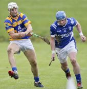 Richie Foley battling for possession during the County Senior Hurling Championship game v Fourmilewater at Fraher Field