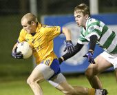 Brian Looby forces his man away from goal during the County Senior Football Championship Semi Final against the Nire