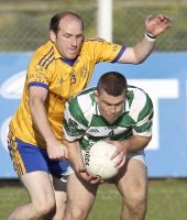 Ronan Sheehan comes away with the ball in the County Senior Football Championship fixture with the Nire 