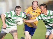 Ronan Sheehan and Mark Ferncombe battle for possession in the County Senior Football match v the Nire 