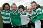 Young Ballinacourty supporters celebrate