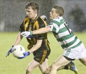 Tiernan Murray fights for possession in the Western Intermediate Football Final against Brickey Rangers at Fraher Field